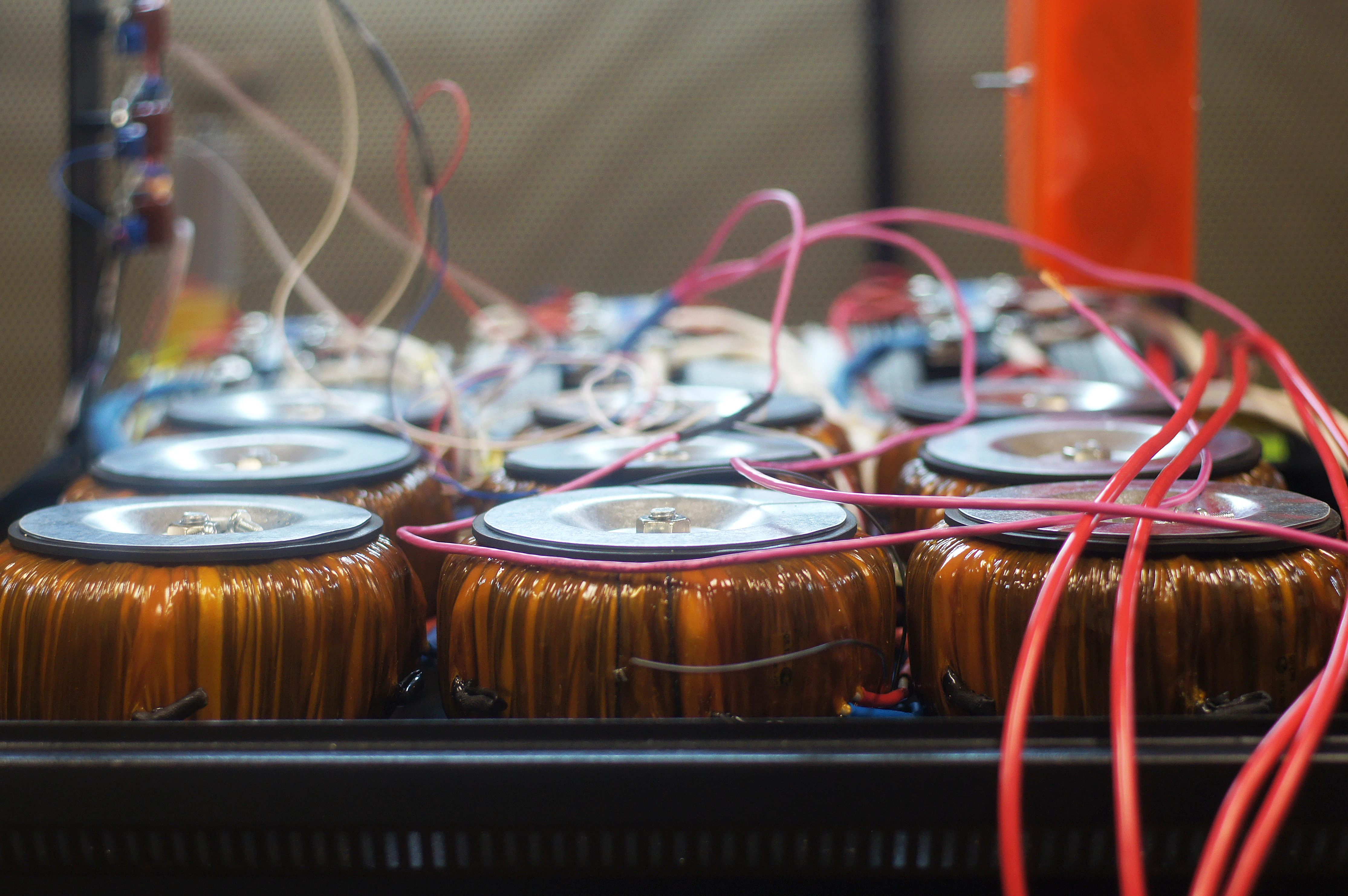 A close up of many wires connected to a device.
